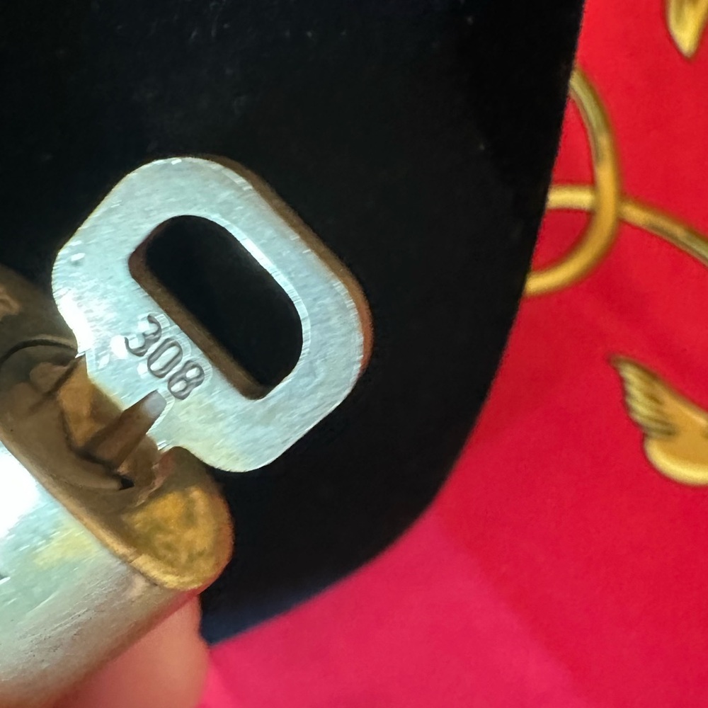 Authentic Louis Vuitton lock and key #308
with unbranded chain and earrings. - Picture 5 of 5